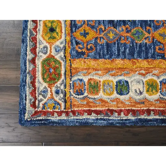 Navy Blue Orange And Green Wool Floral Hand Tufted Distressed Area Rug Photo 4