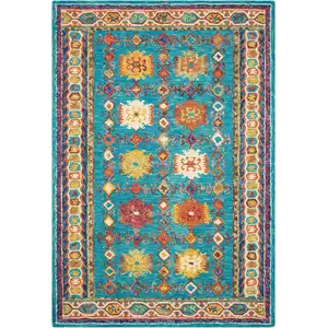 Photo of Navy Blue Orange And Green Wool Floral Hand Tufted Distressed Area Rug