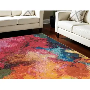 Photo of Navy Blue Red and Orange Abstract Non Skid Area Rug