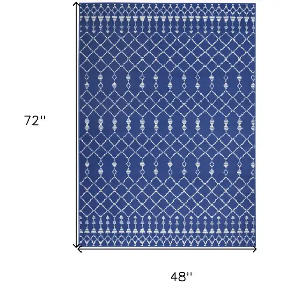 Ivory And Blue Geometric Area Rug Photo 3