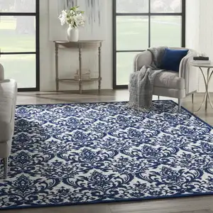 Photo of Navy Blue and Ivory Damask Distressed Area Rug