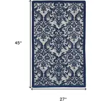 Photo of Navy Blue and Ivory Damask Distressed Area Rug