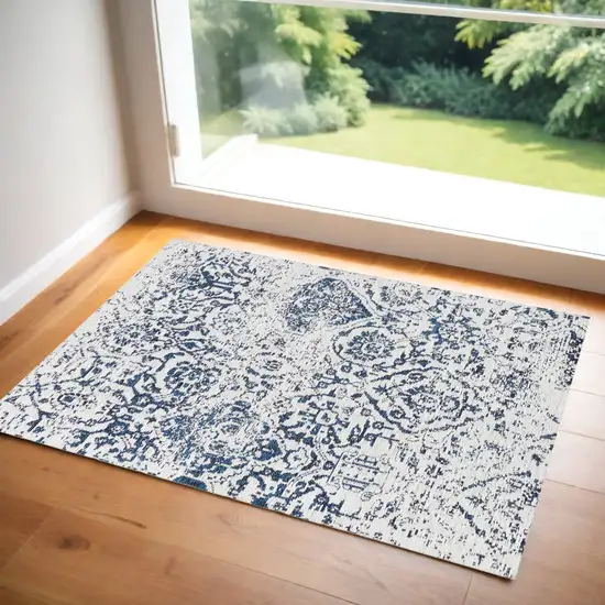 Navy Blue and Ivory Damask Distressed Area Rug Photo 1