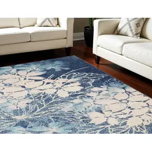 Photo of Navy Blue and Ivory Floral Area Rug