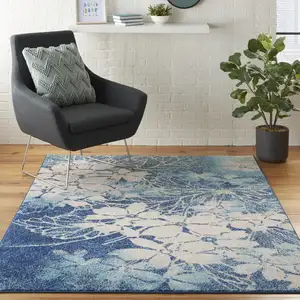 Photo of Navy Blue and Ivory Floral Area Rug