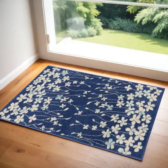 Navy Blue and Ivory Floral Area Rug Photo 1