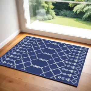 Photo of Navy Blue and Ivory Geometric Area Rug