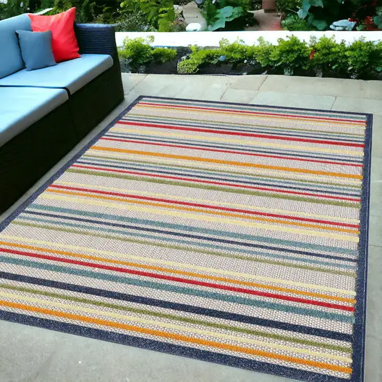 Ivory And Blue Striped Stain Resistant Indoor Outdoor Area Rug Photo 1