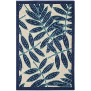 Photo of Navy and Beige Leaves Indoor Outdoor Area Rug