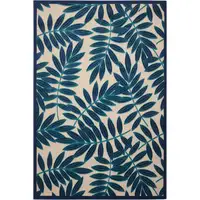 Photo of Navy and Beige Leaves Indoor Outdoor Area Rug