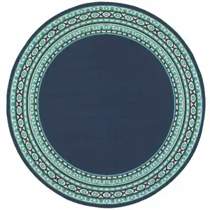 Photo of Navy and Green Geometric Indoor Outdoor Area Rug