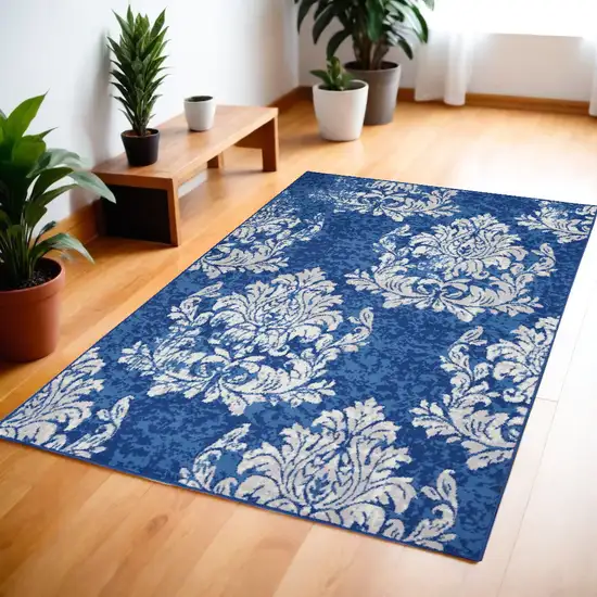 Blue And Ivory Floral Dhurrie Area Rug Photo 1