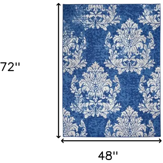 Blue And Ivory Floral Dhurrie Area Rug Photo 5