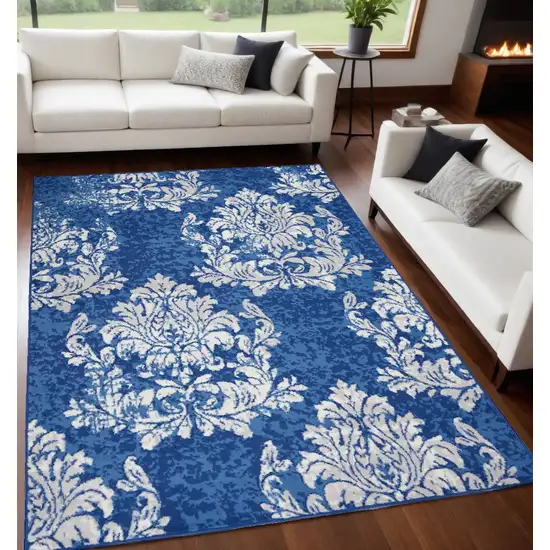 Blue And Ivory Floral Dhurrie Area Rug Photo 1