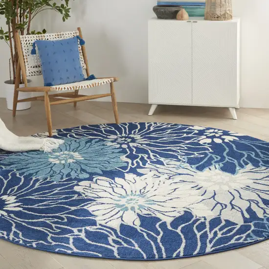 8' Blue And Ivory Round Floral Dhurrie Area Rug Photo 7