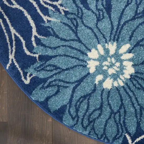 8' Blue And Ivory Round Floral Dhurrie Area Rug Photo 5