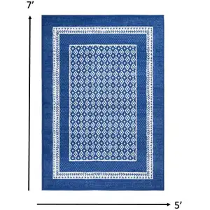 Photo of Navy and Ivory Geometric Area Rug