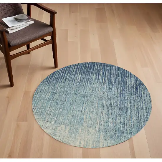 4' Ivory And Blue Round Abstract Power Loom Area Rug Photo 1