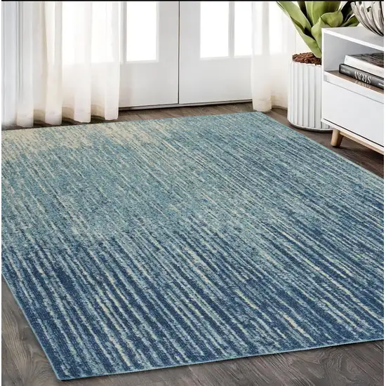 Ivory And Blue Abstract Stripes Power Loom Area Rug Photo 1