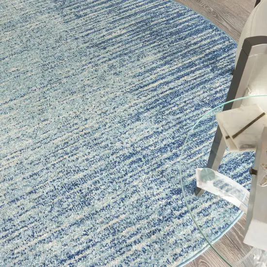 5' Blue and Ivory Abstract Power Loom Round Rug Photo 7