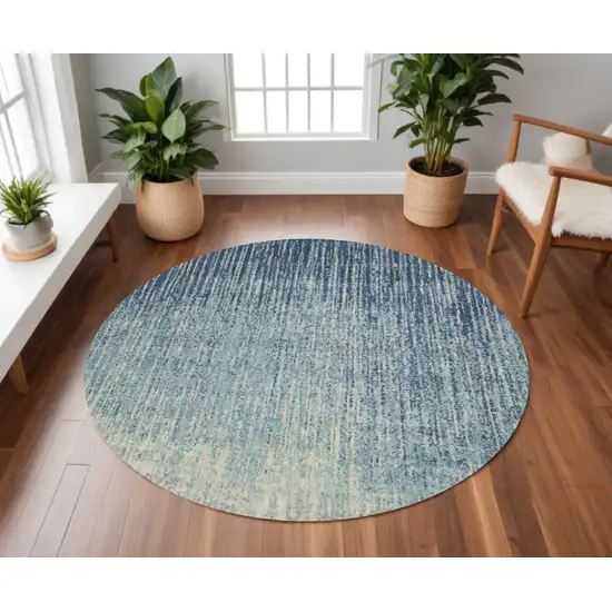 8' Ivory And Blue Round Abstract Power Loom Area Rug Photo 1