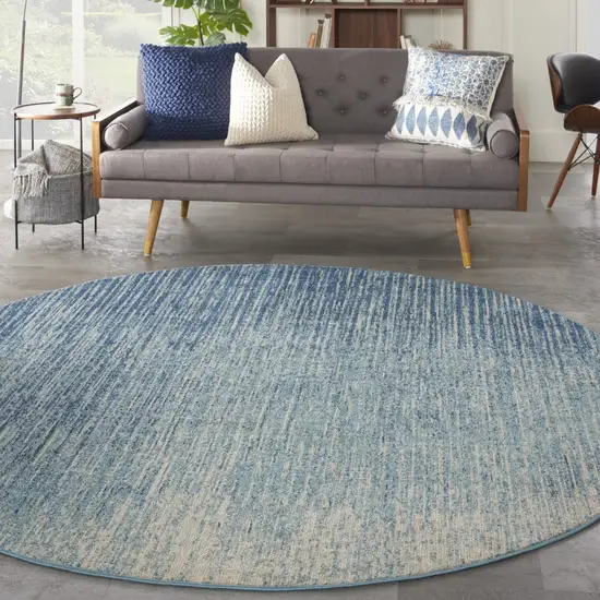 8' Blue and Ivory Abstract Power Loom Round Rug Photo 6