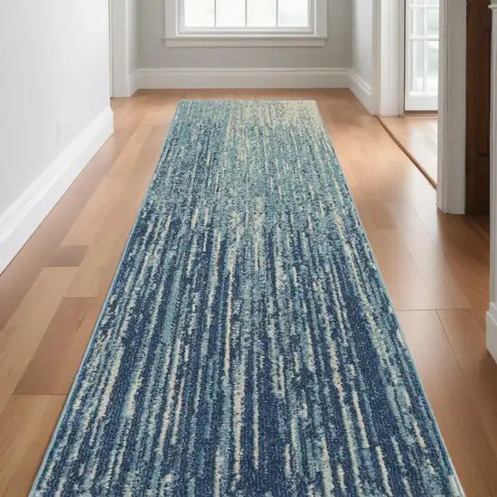 10' Ivory And Blue Abstract Power Loom Runner Rug Photo 1