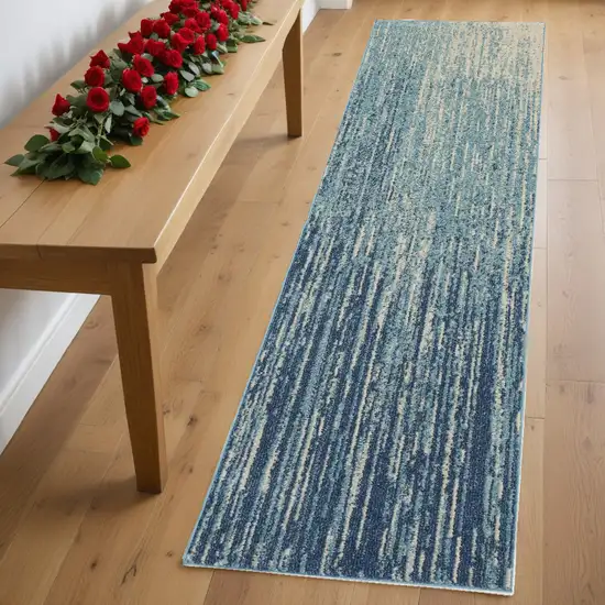 8' Ivory And Blue Abstract Power Loom Runner Rug Photo 1