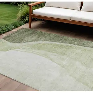 Photo of Olive Green And Beige Abstract Washable Indoor Outdoor Area Rug