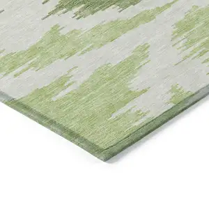 Photo of Olive Green And Beige Abstract Washable Indoor Outdoor Area Rug