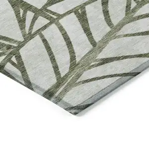 Photo of Olive Green And Beige Floral Washable Indoor Outdoor Area Rug