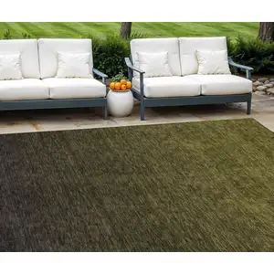 Photo of Olive Green And Charcoal Abstract Washable Indoor Outdoor Area Rug