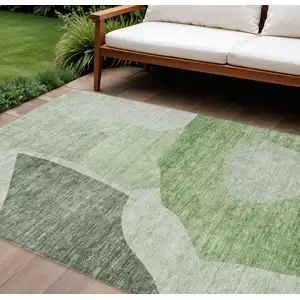 Photo of Olive Green And Fern Green Abstract Washable Indoor Outdoor Area Rug