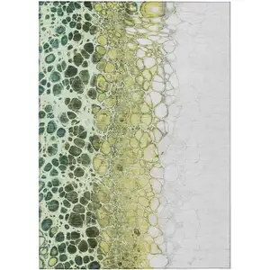 Photo of Olive Green And Gold Abstract Washable Indoor Outdoor Area Rug