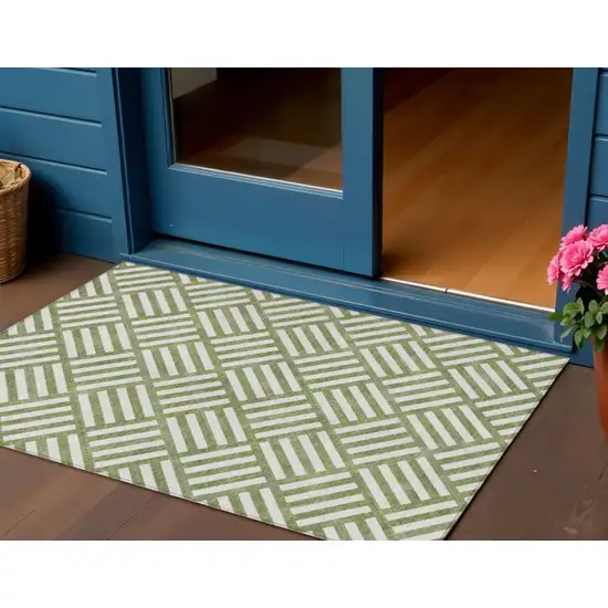 Olive Green And Ivory Geometric Washable Indoor Outdoor Area Rug Photo 1