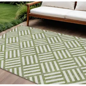 Photo of Olive Green And Ivory Geometric Washable Indoor Outdoor Area Rug