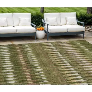 Photo of Olive Green Brown And Gold Southwestern Washable Indoor Outdoor Area Rug