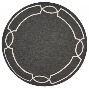 Photo of Onyx Black Hand Hooked UV Treated Bordered Round Indoor Outdoor Area Rug