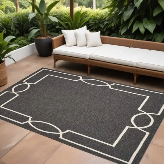 Black And White Geometric Indoor Outdoor Area Rug Photo 1