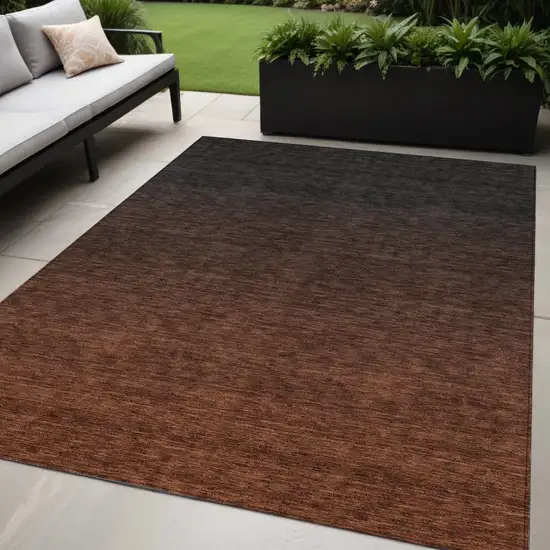 Orange And Charcoal Abstract Washable Indoor Outdoor Area Rug Photo 1