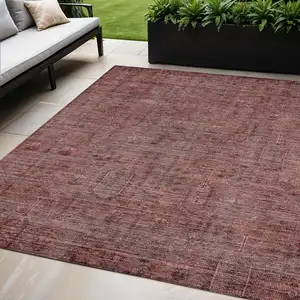 Photo of Orange And Copper Southwestern Washable Indoor Outdoor Area Rug