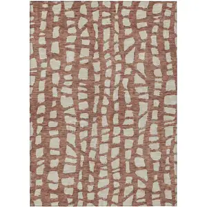 Photo of Orange And Ivory Abstract Washable Indoor Outdoor Area Rug