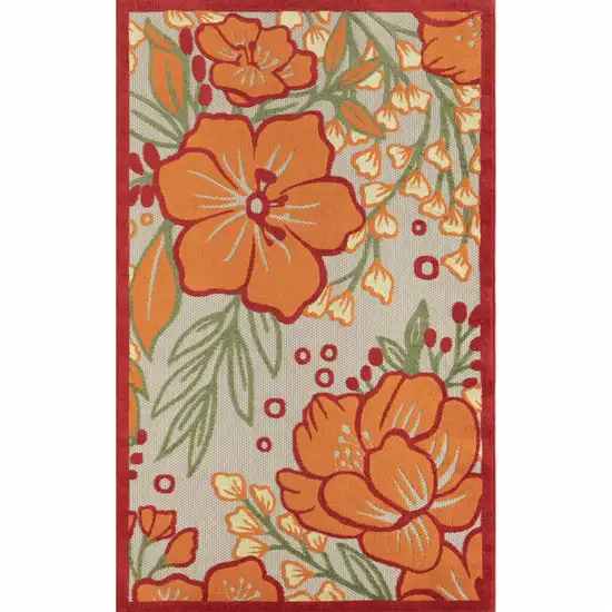 Orange And Ivory Floral Stain Resistant Indoor Outdoor Area Rug Photo 1