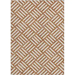 Photo of Orange And Ivory Geometric Washable Indoor Outdoor Area Rug