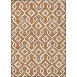 Photo of Orange And Ivory Geometric Washable Indoor Outdoor Area Rug