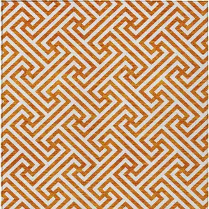 Photo of Orange And Ivory Geometric Washable Indoor Outdoor Area Rug