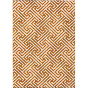 Photo of Orange And Ivory Geometric Washable Indoor Outdoor Area Rug