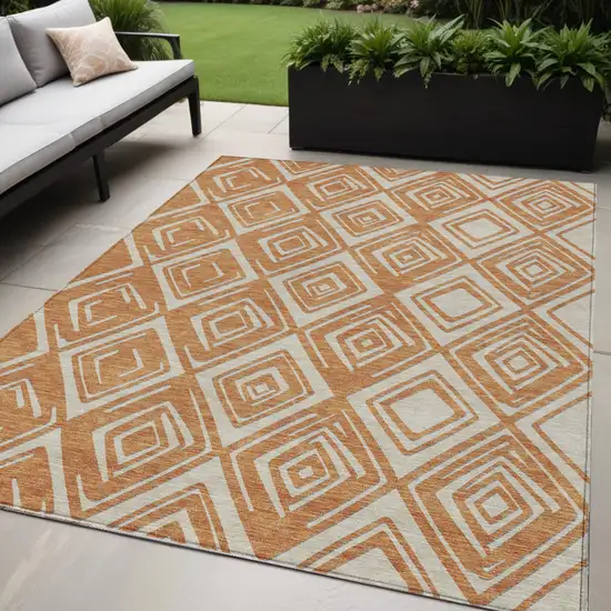 Orange And Ivory Geometric Washable Indoor Outdoor Area Rug Photo 1