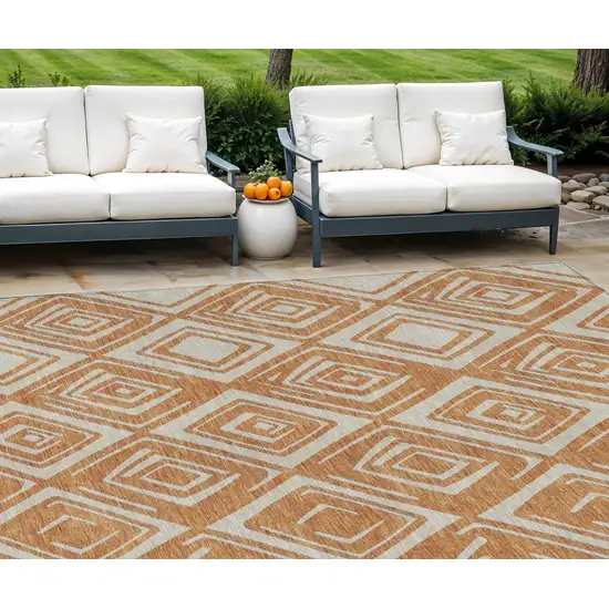 Orange And Ivory Geometric Washable Indoor Outdoor Area Rug Photo 1