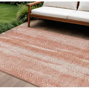 Photo of Orange And Salmon Botanical Leaves Washable Indoor Outdoor Area Rug